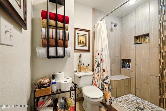 664 E Auklet Ave, Palmer, AK 99645 - bathroom featuring toilet and a shower stall
