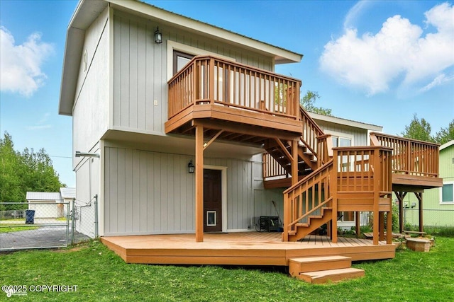 664 E Auklet Ave, Palmer, AK 99645 - back of property with a gate, a wooden deck, and stairs