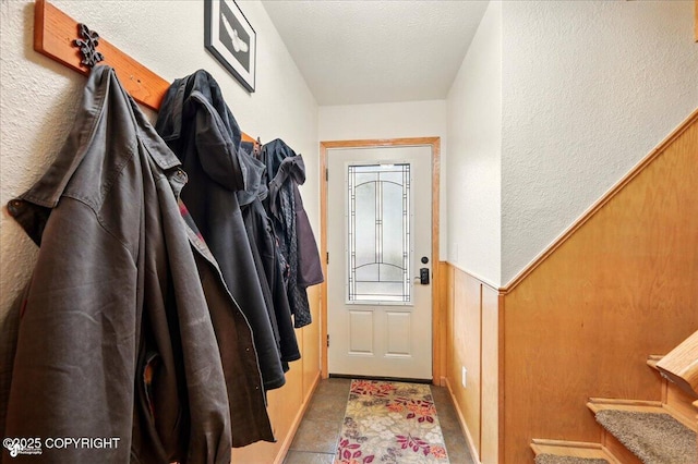 664 E Auklet Ave, Palmer, AK 99645 - doorway to outside featuring a textured wall and a textured ceiling