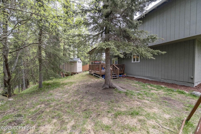 9224 Geese Cir, Eagle River, AK 99577 - view of yard with a wooden deck