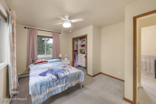 9224 Geese Cir, Eagle River, AK 99577 - carpeted bedroom with a baseboard radiator, baseboards, and a ceiling fan