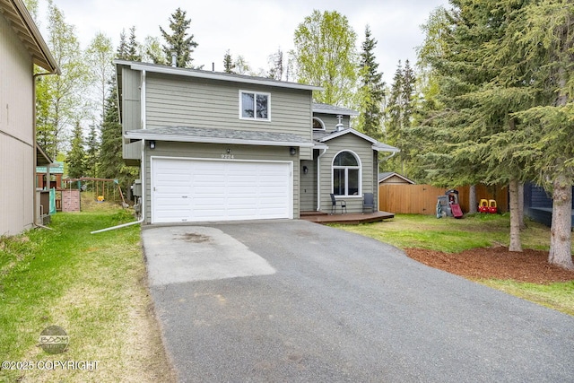 9224 Geese Cir, Eagle River, AK 99577 - view of front of property with driveway, a garage, and roof with shingles