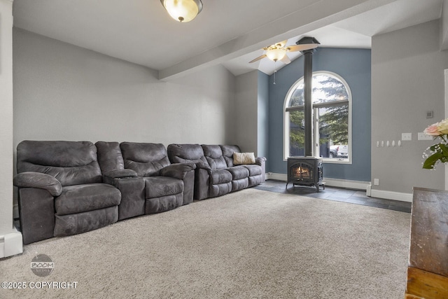 9224 Geese Cir, Eagle River, AK 99577 - living area featuring a baseboard heating unit, lofted ceiling, a ceiling fan, baseboards, and carpet flooring