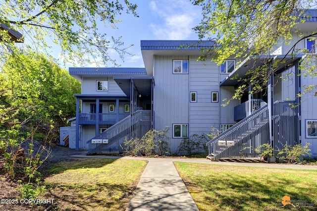 832 O Pl Unit 832, Anchorage, AK 99501 - view of property with stairway