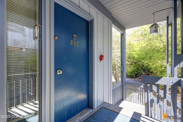 832 O Pl Unit 832, Anchorage, AK 99501 - doorway to property with a porch
