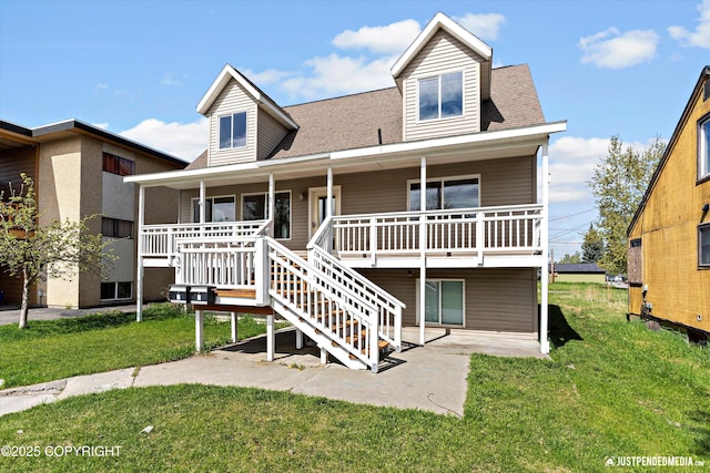 437 E 14th Ave, Anchorage, AK 99501 - view of front of property featuring a front yard, a shingled roof, stairs, and covered porch