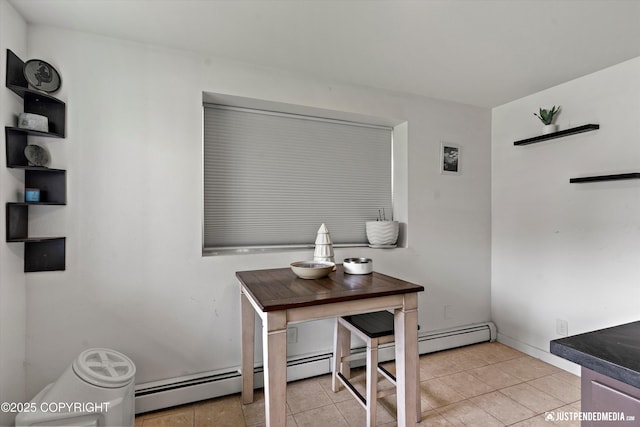 437 E 14th Ave, Anchorage, AK 99501 - dining room featuring light tile patterned flooring and baseboards