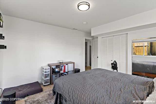 437 E 14th Ave, Anchorage, AK 99501 - bedroom featuring a closet and tile patterned flooring