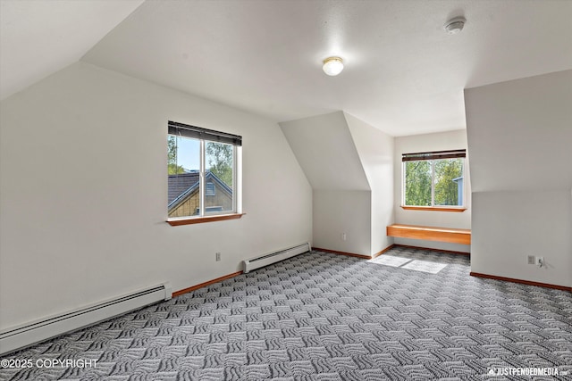 437 E 14th Ave, Anchorage, AK 99501 - bonus room with baseboard heating, lofted ceiling, carpet, and healthy amount of natural light
