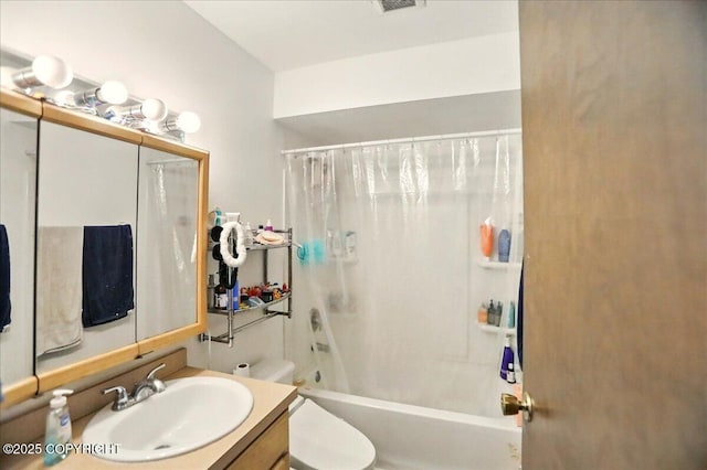 4109 Garfield St, Anchorage, AK 99503 - full bath featuring toilet, vanity, and shower / bath combo with shower curtain