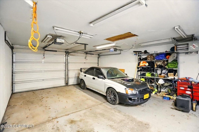 4109 Garfield St, Anchorage, AK 99503 - garage featuring a garage door opener