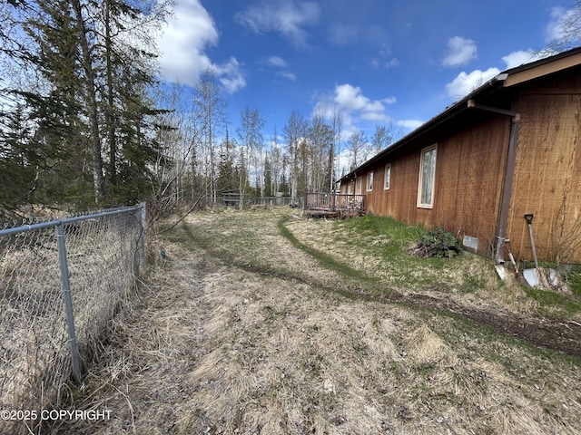 315 On Par Ln, Soldotna, AK 99669 - view of yard with a wooden deck and fence