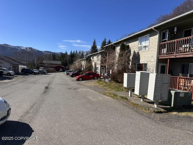 3220 Timberline Ct Unit 207, Ketchikan, AK 99901 - view of asphalt street featuring a mountain view