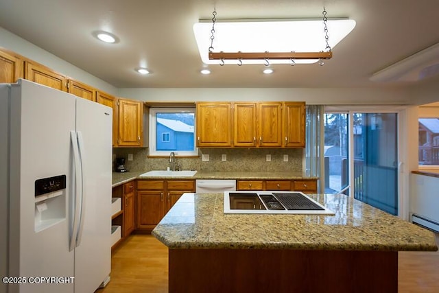 19404 Middleton Loop, Eagle River, AK 99577 - kitchen featuring white appliances, a sink, a kitchen island, backsplash, and recessed lighting