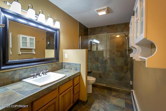 19404 Middleton Loop, Eagle River, AK 99577 - full bathroom with baseboard heating, a shower stall, toilet, and vanity