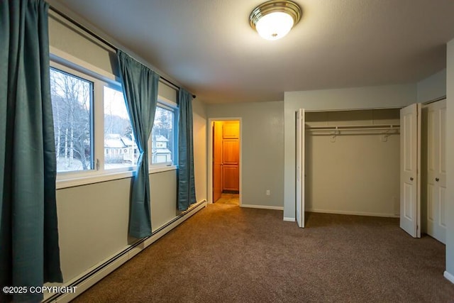 19404 Middleton Loop, Eagle River, AK 99577 - unfurnished bedroom featuring a baseboard radiator, carpet, a closet, and baseboards