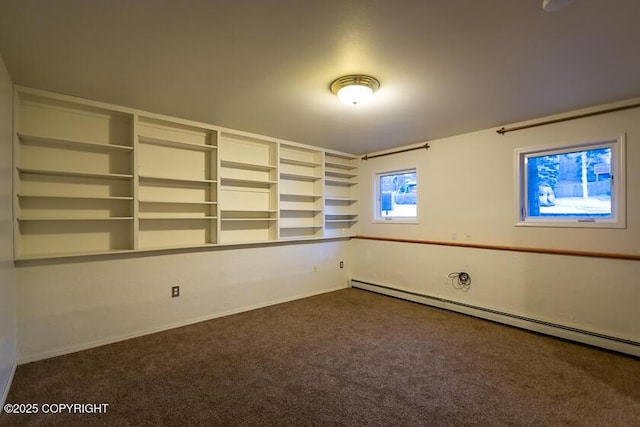 19404 Middleton Loop, Eagle River, AK 99577 - carpeted empty room with a baseboard heating unit and baseboards