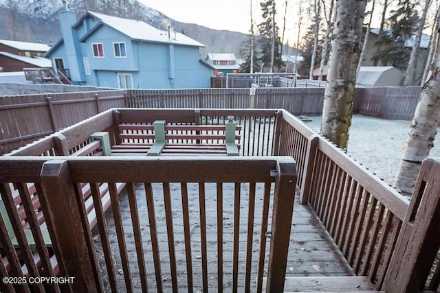 19404 Middleton Loop, Eagle River, AK 99577 - deck featuring a mountain view and a fenced backyard