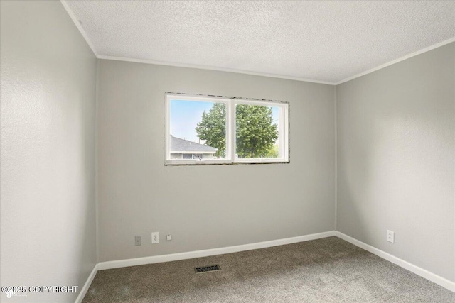 3624 E 16th Ave, Anchorage, AK 99508 - carpeted empty room with baseboards, a textured ceiling, and ornamental molding