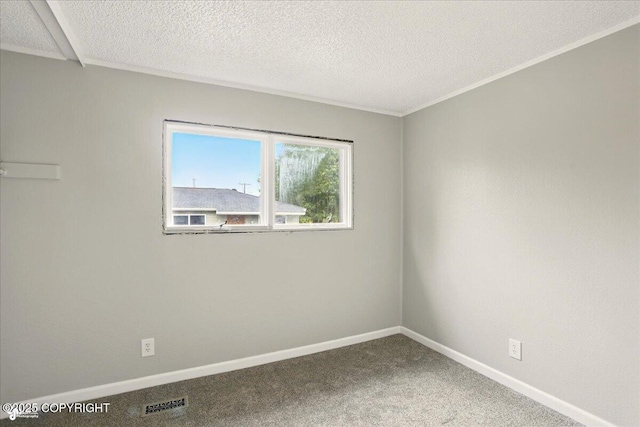 3624 E 16th Ave, Anchorage, AK 99508 - unfurnished room with carpet floors, baseboards, and a textured ceiling