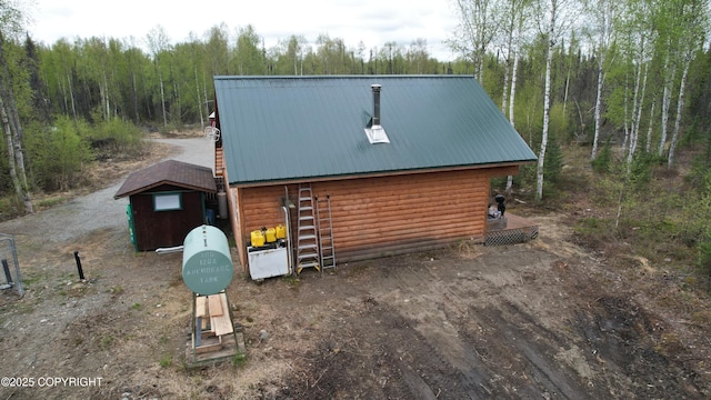 garage with a wooded view