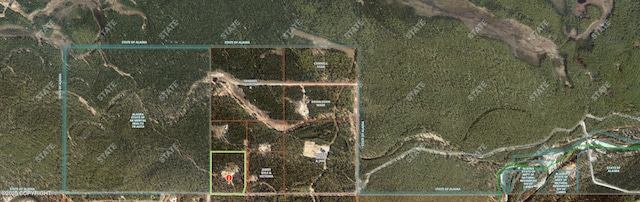 aerial overview of property's location featuring property parcel outlined