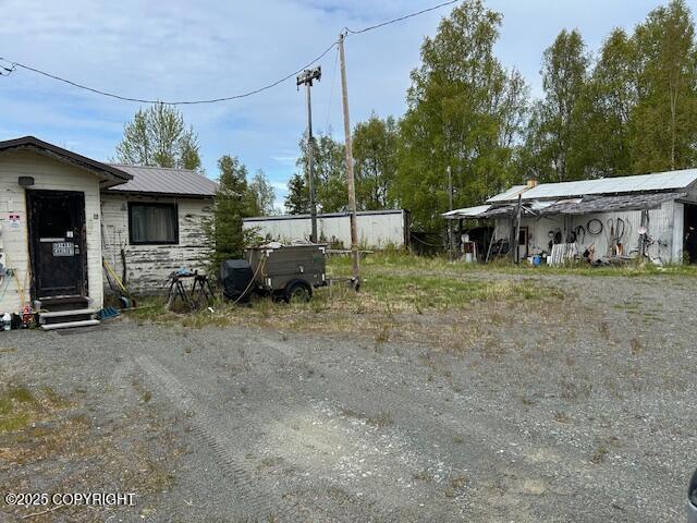 31481 Carl St, Soldotna, AK 99669 - view of yard featuring entry steps