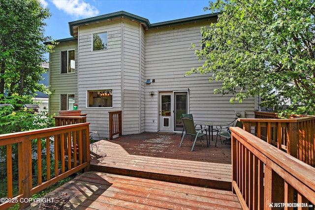 10321 Compass Cir, Anchorage, AK 99515 - deck featuring outdoor dining area
