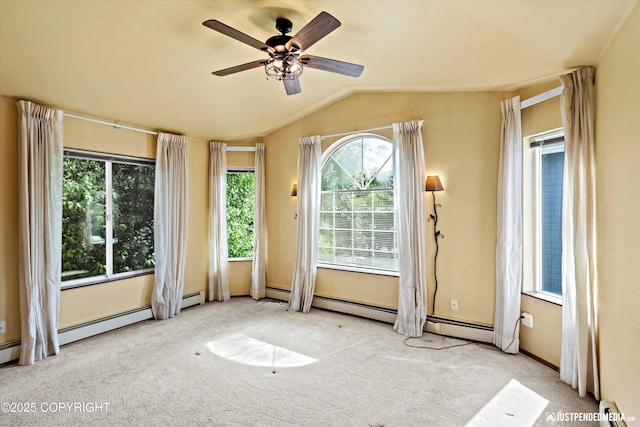 10321 Compass Cir, Anchorage, AK 99515 - spare room with a baseboard radiator, vaulted ceiling, carpet, and a ceiling fan