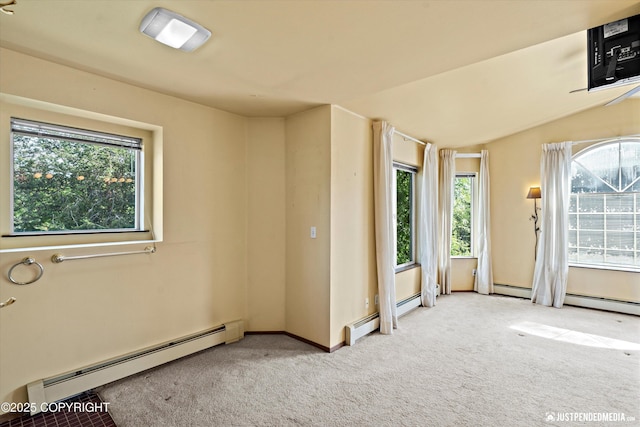 10321 Compass Cir, Anchorage, AK 99515 - empty room featuring baseboard heating, light carpet, and baseboards