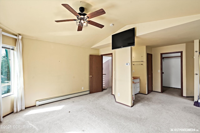 10321 Compass Cir, Anchorage, AK 99515 - unfurnished bedroom with a baseboard heating unit, light colored carpet, lofted ceiling, and ceiling fan