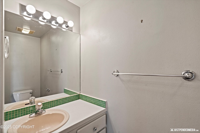 10321 Compass Cir, Anchorage, AK 99515 - bathroom with vanity and toilet
