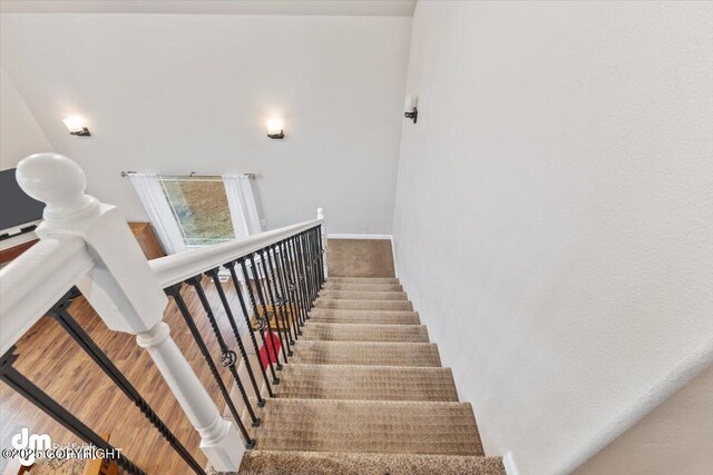 53578 Bell Ave, Nikiski/North Kenai, AK 99611 - staircase with baseboards