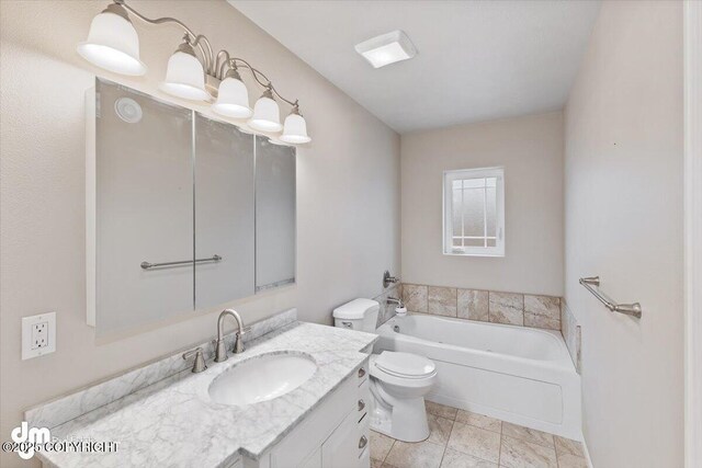 53578 Bell Ave, Nikiski/North Kenai, AK 99611 - full bath with toilet, a garden tub, vanity, and tile patterned flooring