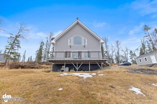 53578 Bell Ave, Nikiski/North Kenai, AK 99611 - rear view of property featuring a wooden deck and a yard