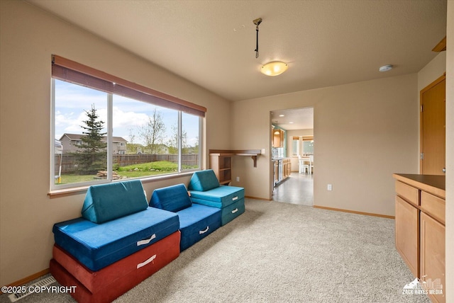 241 N Pasture Pl, Palmer, AK 99645 - living area with light colored carpet and baseboards