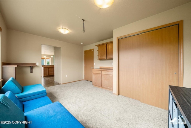 241 N Pasture Pl, Palmer, AK 99645 - living room featuring light carpet and baseboards