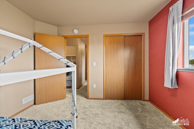 241 N Pasture Pl, Palmer, AK 99645 - unfurnished bedroom with carpet floors, a closet, and baseboards