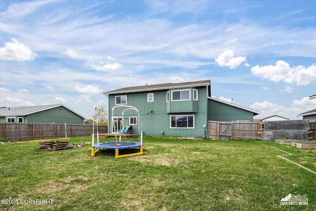 241 N Pasture Pl, Palmer, AK 99645 - rear view of property with a trampoline