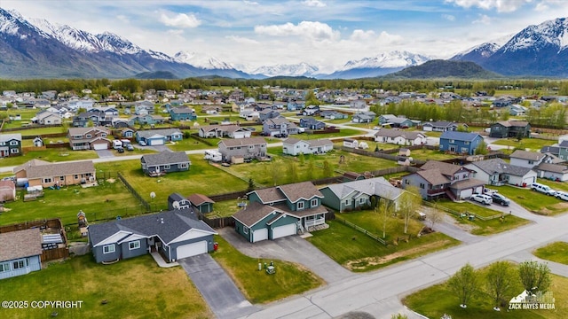 241 N Pasture Pl, Palmer, AK 99645 - aerial perspective of suburban area with a mountain backdrop