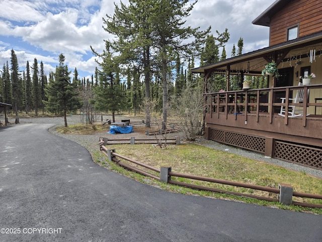 35515 King Salmon Ave, Soldotna, AK 99669 - view of yard featuring fence and a deck