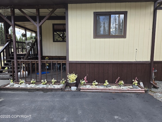 35515 King Salmon Ave, Soldotna, AK 99669 - view of home's exterior featuring a patio area and stairway