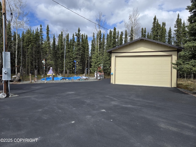 35515 King Salmon Ave, Soldotna, AK 99669 - detached garage with a view of trees
