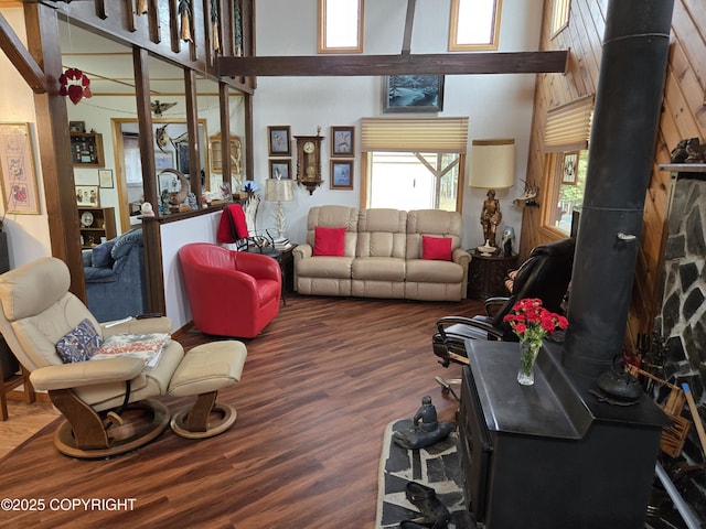 35515 King Salmon Ave, Soldotna, AK 99669 - living area featuring wood finished floors, a high ceiling, and a wood stove