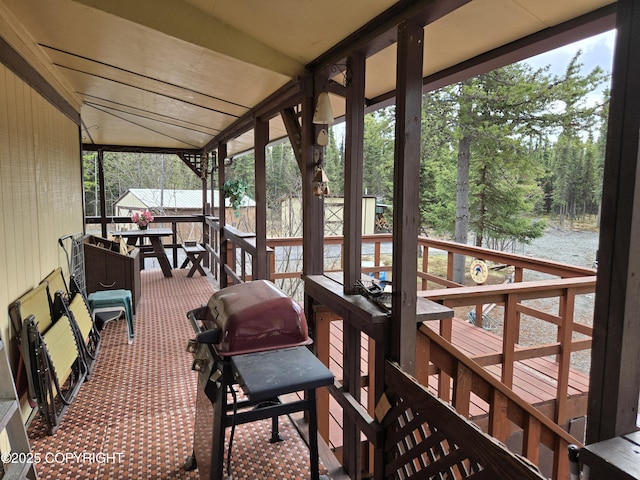 35515 King Salmon Ave, Soldotna, AK 99669 - sunroom with healthy amount of natural light and vaulted ceiling