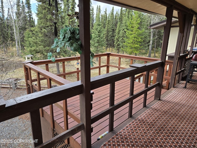 35515 King Salmon Ave, Soldotna, AK 99669 - wooden deck featuring a view of trees