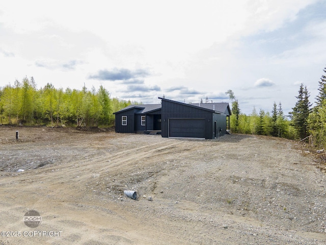 1866 S Rolling Hills St, Wasilla, AK 99623 - view of outbuilding featuring an attached garage and driveway