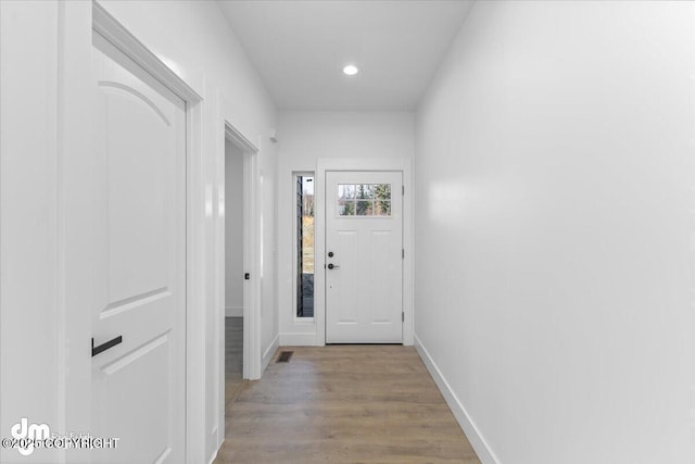 1866 S Rolling Hills St, Wasilla, AK 99623 - doorway with wood finished floors, recessed lighting, and baseboards