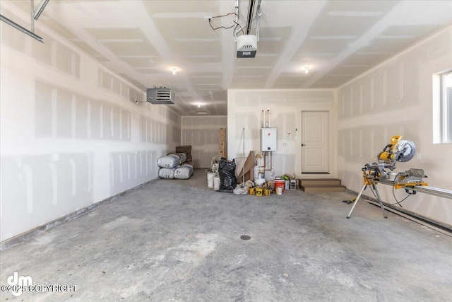 1866 S Rolling Hills St, Wasilla, AK 99623 - garage featuring a garage door opener and water heater