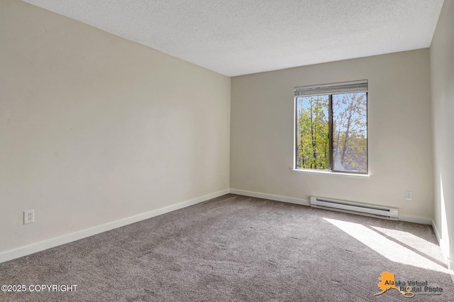 4640 Reka Dr Unit 19, Anchorage, AK 99508 - carpeted spare room with a baseboard radiator, a textured ceiling, and baseboards